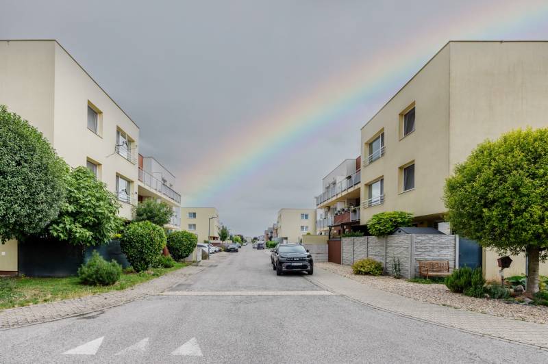 Agátová Street in Rovinka with a rainbow over the 2-bedroom apartments on both sides.