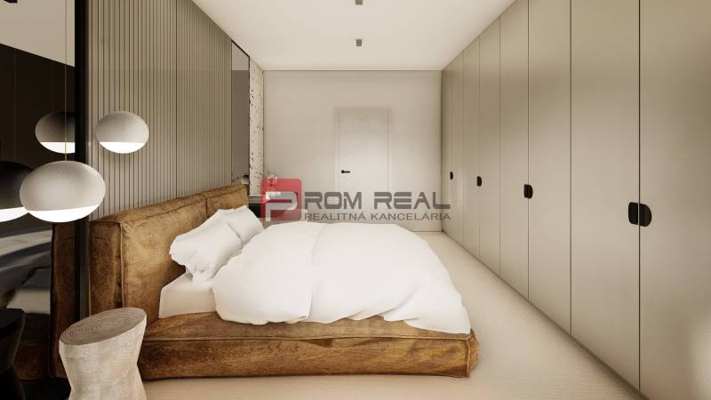 Elegant bedroom with a large bed and built-in wardrobes in a 3-room apartment.