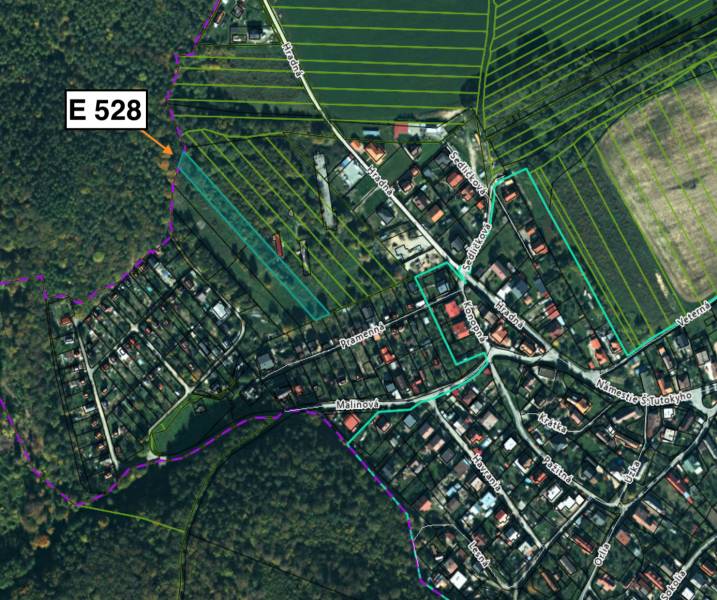 Aerial view of agricultural and forest lands in the village of Sokoľ with marked parcels.