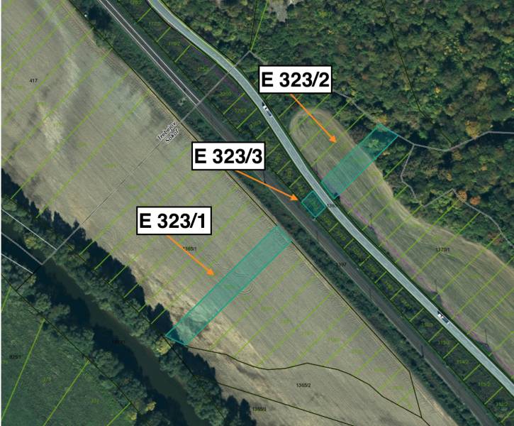 Aerial view of agricultural and forest land near Sokoľ, with highlighted parcels.