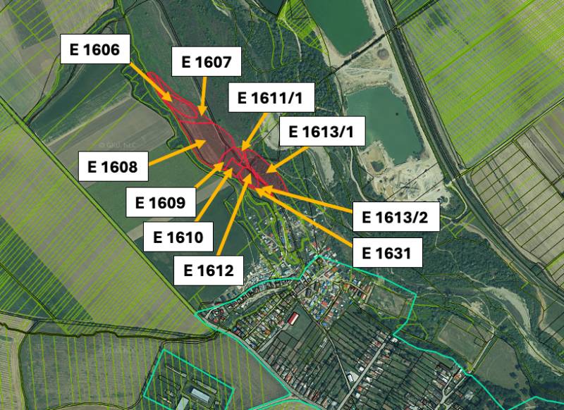 Aerial view of agricultural and forest land near the village of Ražňany with marked parcels.