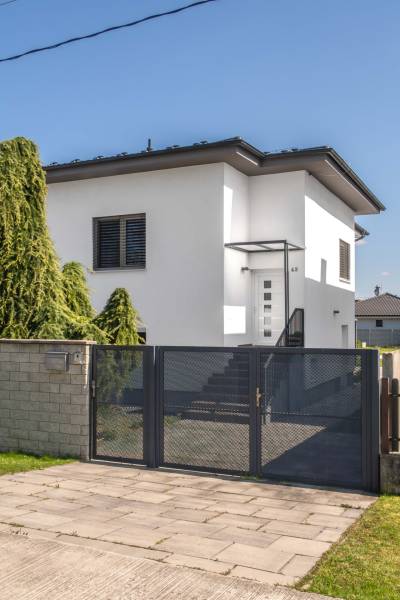 Family house in Ivanka pri Dunaji on Pluhova Street with a gate and a landscaped garden.