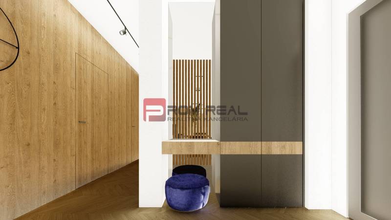 Entrance hall of a 4-room apartment with wooden paneling and a blue pouf.