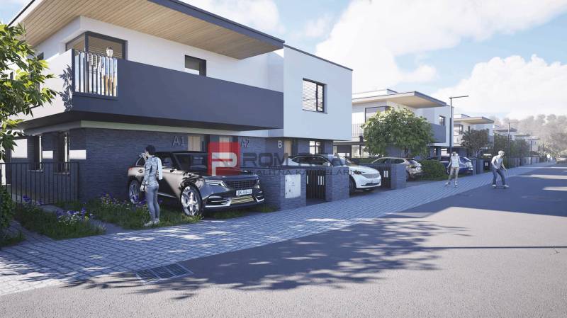 A street with stylish houses and cars in Dubová, ideal for residents of 3-room apartments.