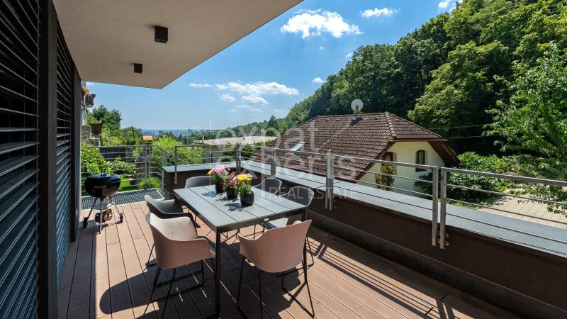A family house balcony overlooking greenery with garden furniture (Bratislava - Ahoj, Sliačska).