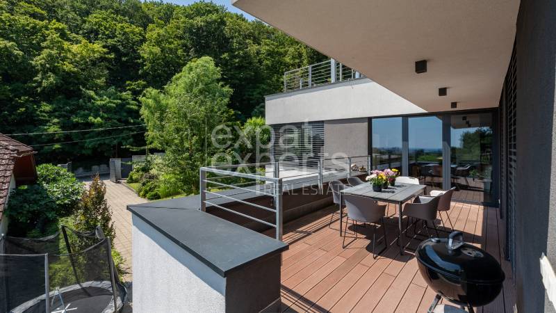 The terrace of a family house on Sliačska Street in Bratislava - Ahoj with a beautiful forest view.