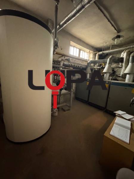 Boiler room with pipes and boilers. Commercial premises with technical facilities.
