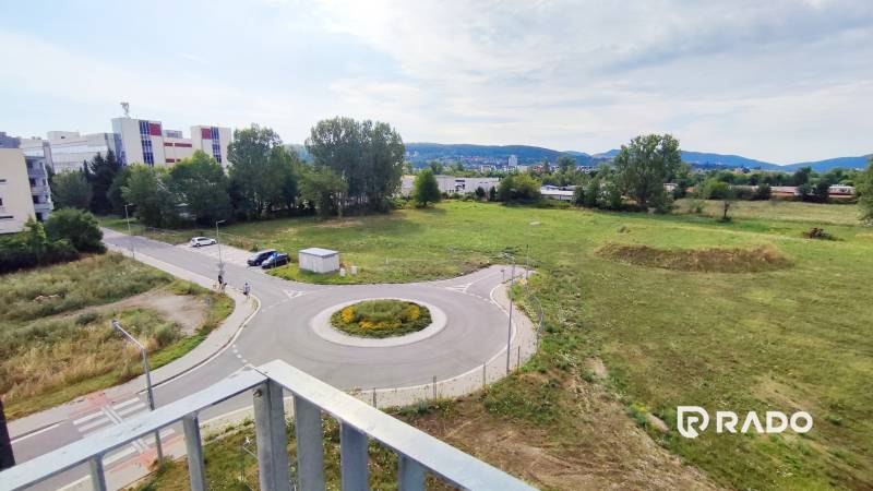 View of the intersection and greenery from Odevná Street in Trenčín.