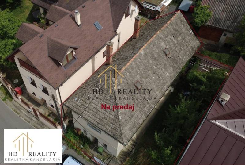 Family house for sale on Bod Bánošom Street in Banská Bystrica surrounded by greenery.