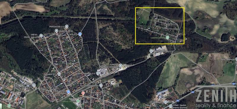 Aerial view of Lozorno, showing gardens surrounded by forests and fields.
