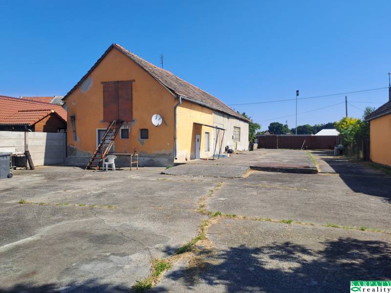 Garage and concrete area at a family house in Sládkovičovo.
