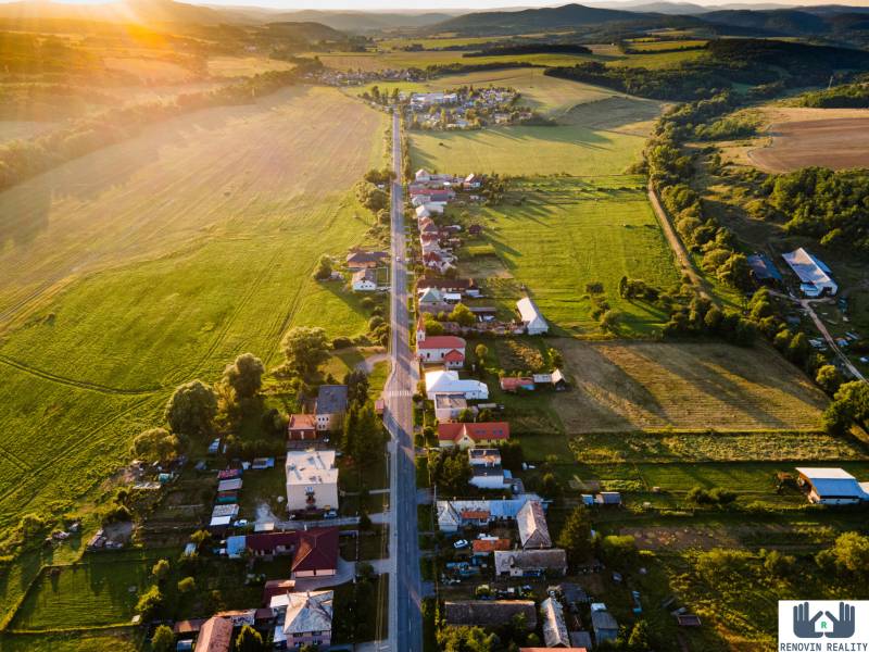 Countryside with houses and a road at sunset, Dolná Strehová, Main Street.