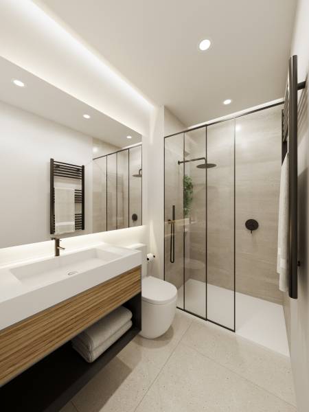A stylish bathroom in a 3-room apartment with a shower and a sink.