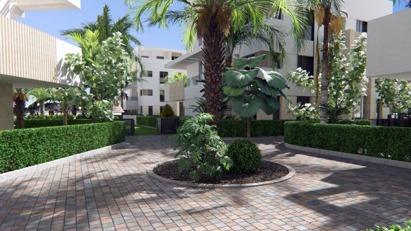 The greenery surrounding the apartment complexes on Santa Rosalia Lake Street in the city of Torre Pacheco.