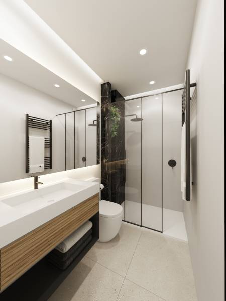 A bathroom in a 3-room apartment with a shower, a mirror, and a wooden sink.