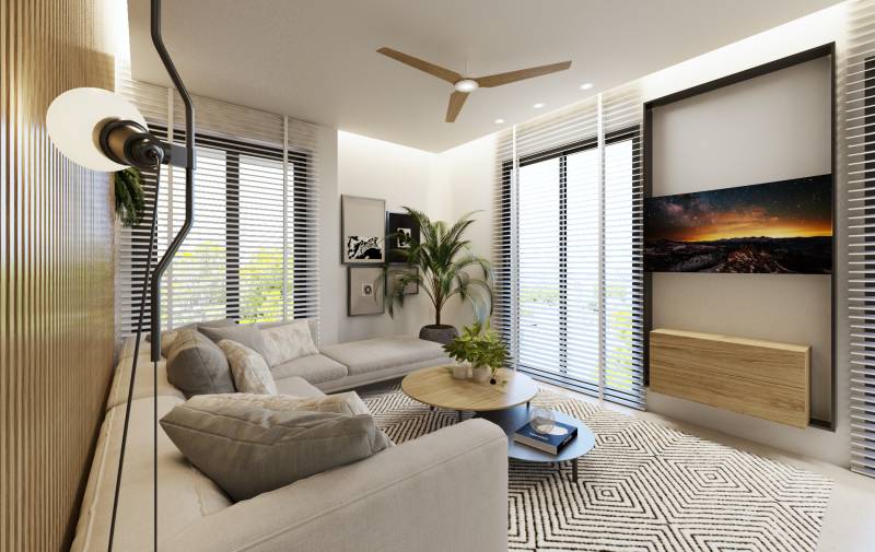 Living room with a sofa, table, and plant in a 3-room apartment.