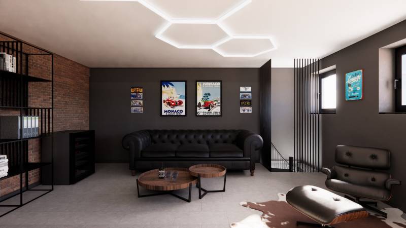 Leather sofa in commercial premises with vintage decorations on the wall.