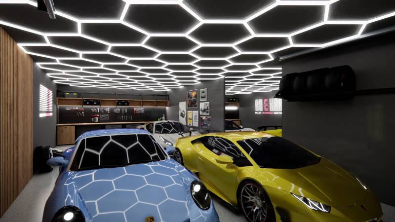 Luxury interior of commercial spaces with cars and unique ceiling design.