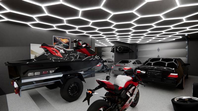 Showroom with cars, a motorcycle, and a jet ski under hexagonal lighting.