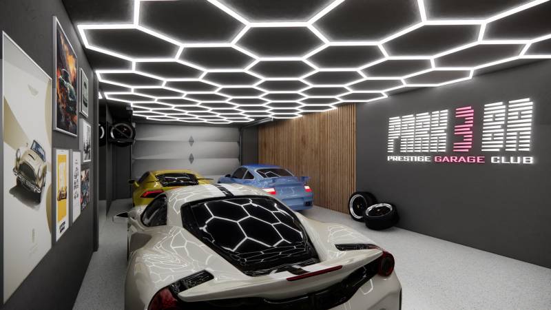 Commercial premises with a garage, luxury cars, impressive lighting, and decorations on the walls.