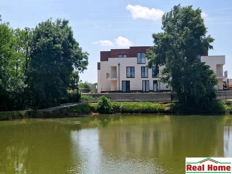 View of a new building by the lake on Vtáčia Street in Senec, 2-room apartment.