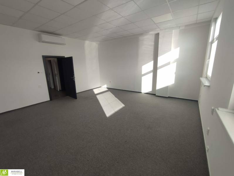 Offices with white walls, carpet, and air conditioning, a simple workspace for work.