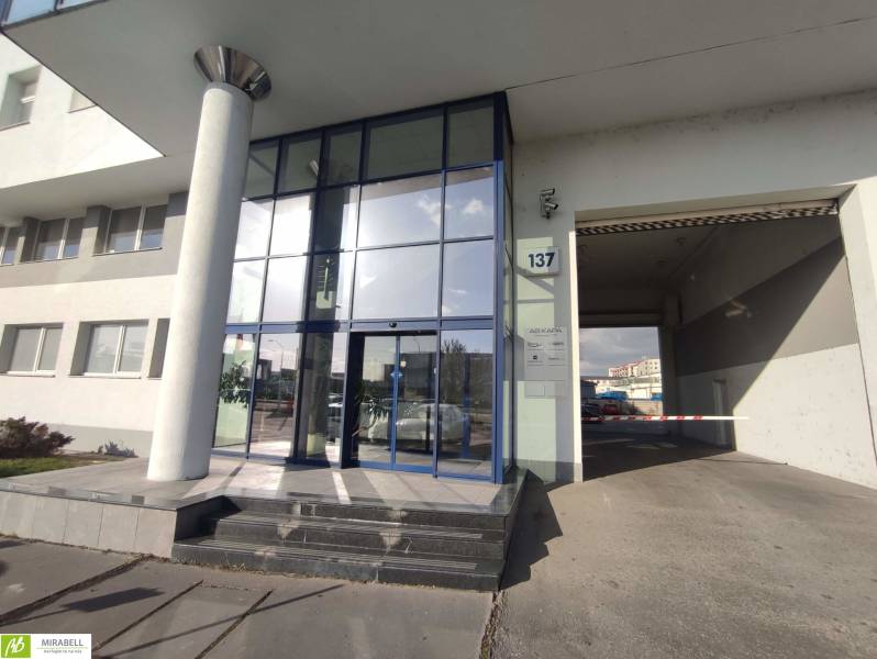 Glass entrance to offices on Vajnorská in Bratislava - Nové Mesto, with two steps.