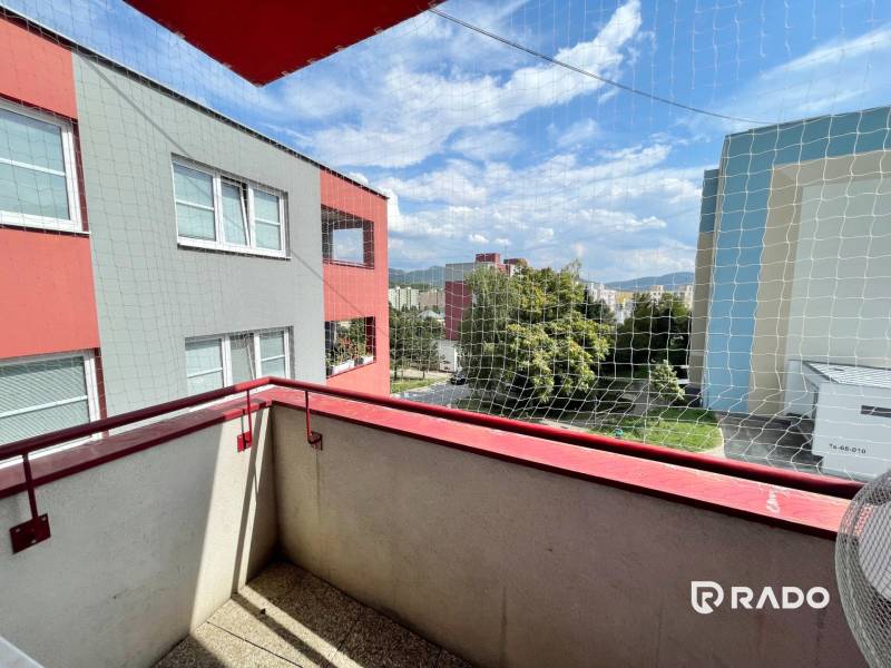 The balcony of a 2-room apartment on Gen. Svoboda Street in Trenčín with a view of the surroundings.