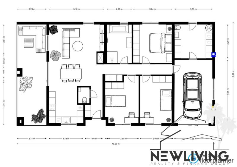 Floor plan in a family house: living room, kitchen, three bedrooms, bathroom, and garage.