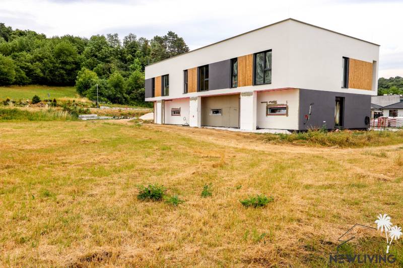 A family house in Piešťany, located near a forest on a large green area.
