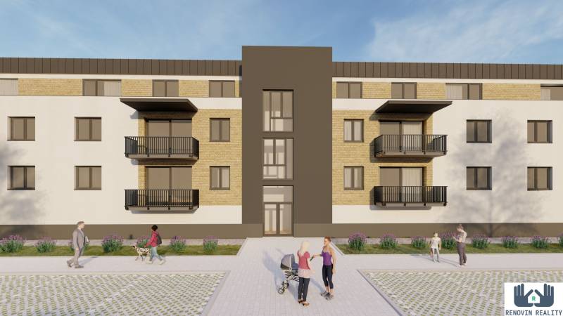 The construction of apartments in Kriváň includes a modern building with balconies and greenery around.