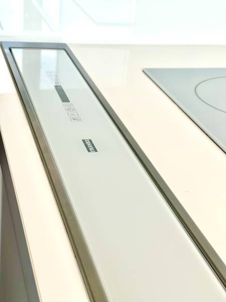 Kitchen cooktop and built-in panel in a 2-room apartment.