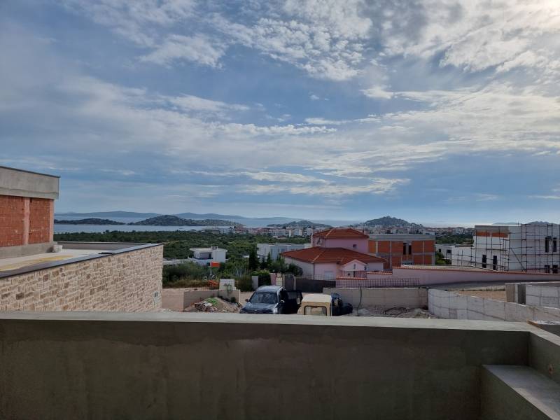The view from the villa in Vodice of the sea and the surrounding landscape under the clouds.