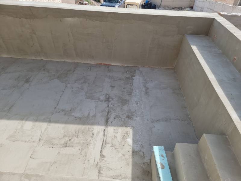 In a construction villa in Vodice, there is a concrete terrace and stairs.
