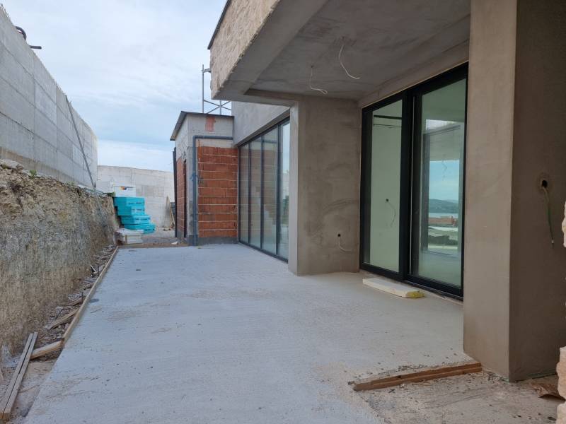 An unfinished terrace at a villa in the city of Vodice with an incomplete facade and glass.