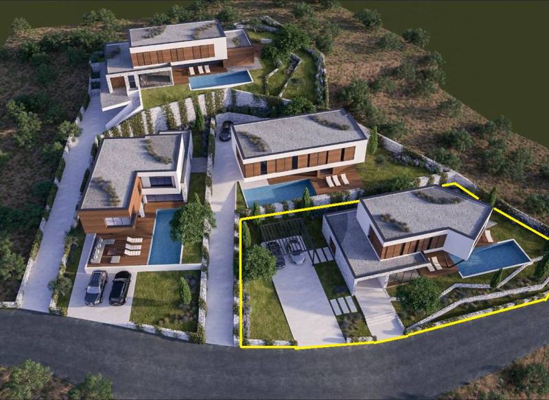 A modern villa with a pool in Vodice surrounded by nature.