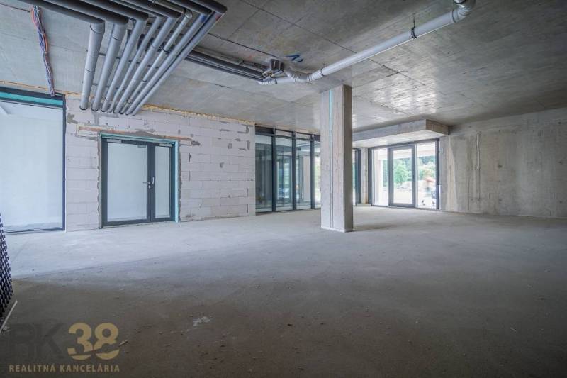 Commercial spaces with large glass facades and concrete elements in Svit.