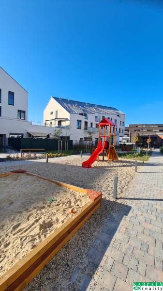 Playground with a sandbox and slide in Bratislava - Jarovce on Perlová Street.