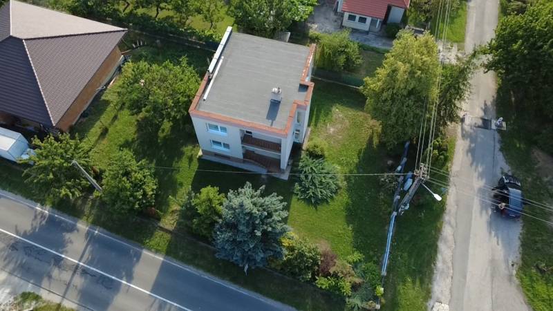 A family house in Rakoľuby, Nové Mesto nad Váhom, surrounded by a garden and neighborhood.