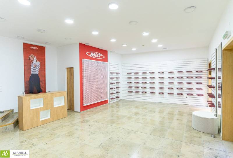Offices with shelves and reception, suitable for business, with a minimalist design.