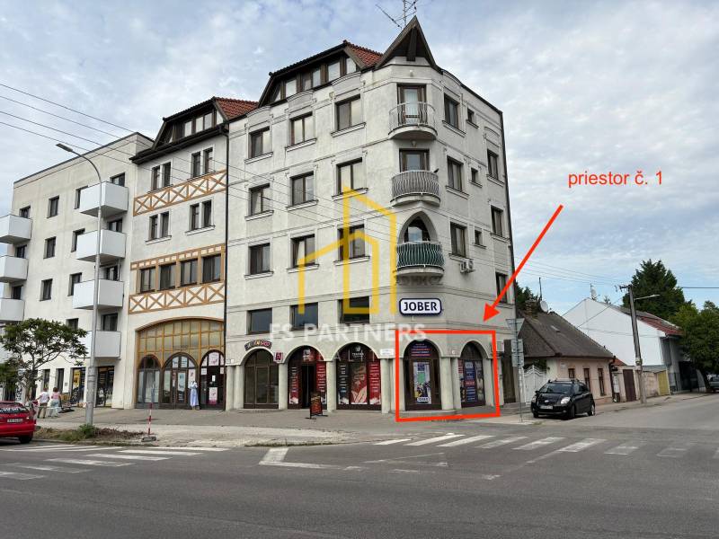 Building on Petőfi Street in Komárno with commercial premises and marked space number 1.