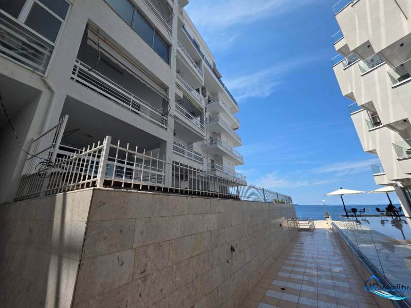Recreational apartment in Sarandë with sea view and poolside terrace.