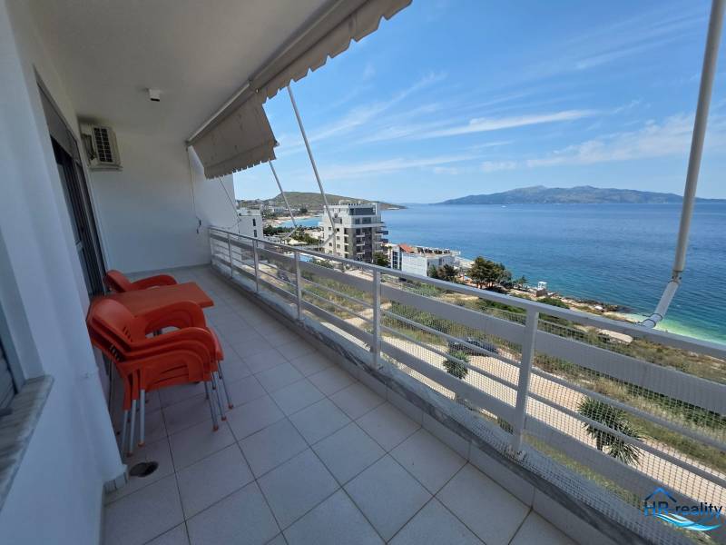 Balcony of a holiday apartment in Sarandë with a view of the sea and surroundings.