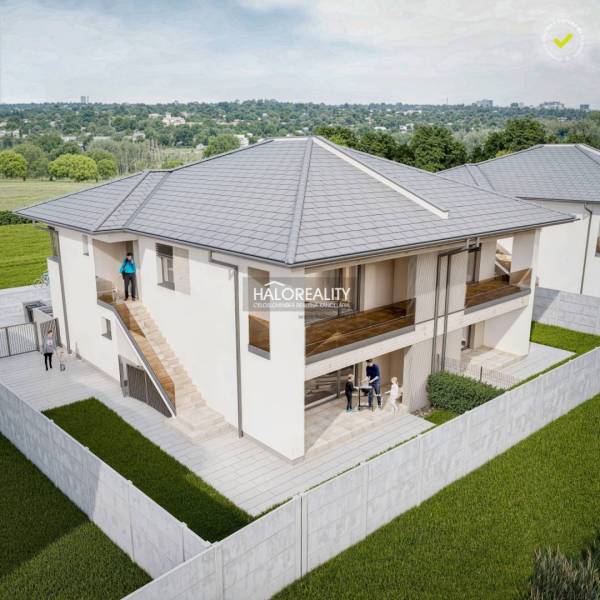 Exterior of a two-story 3-room apartment in Lužianky with two balconies and a garden.