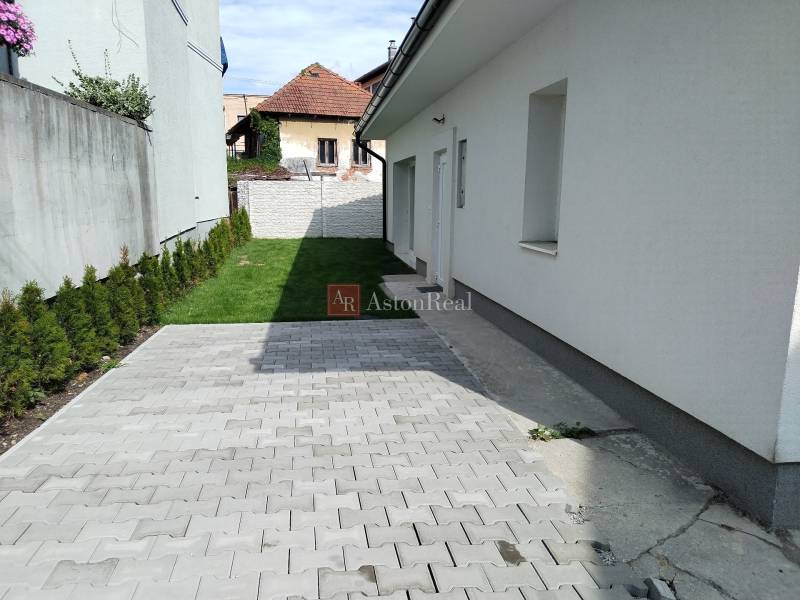 A family house on Turč. Kľačany street in Martin with a covered terrace and lawn.