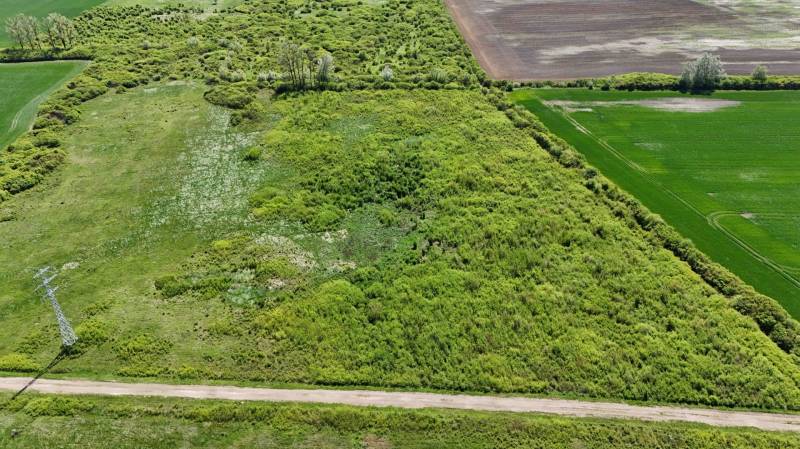 Aerial view of agricultural and forest lands around Zemplínske Kopčany.