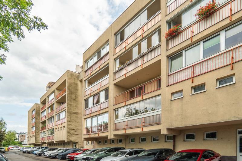 Apartment building on Mierová Street in Bratislava - Ružinov, surroundings with cars and greenery.