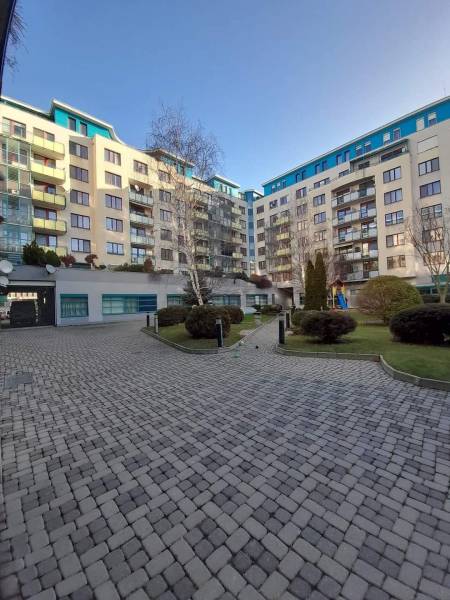 Residential complex with an inner courtyard and a paved walkway on Vajnorská in Bratislava - Nové Mesto.