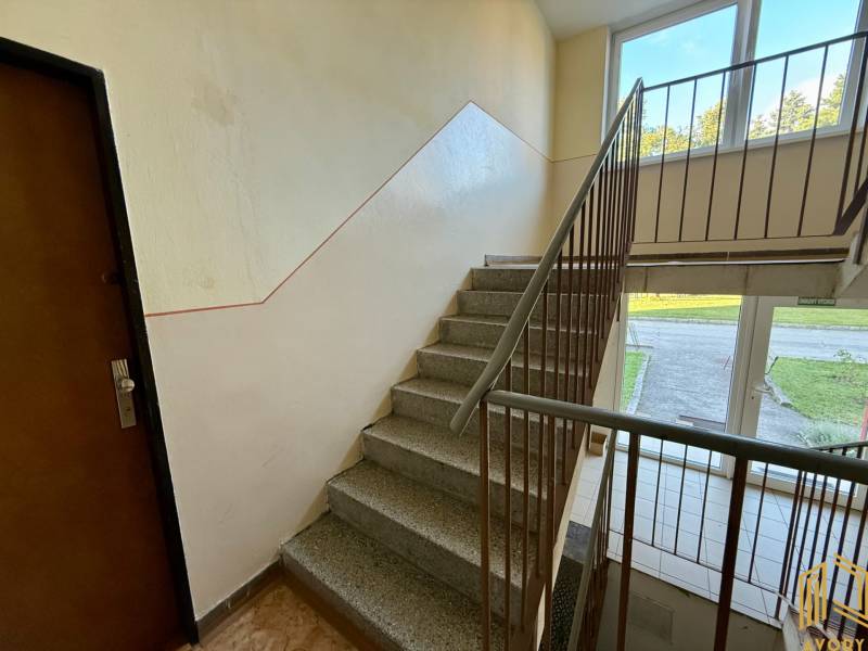 The staircase leads to a 2-room apartment in the Sídlisko area in Jablonica, clean and bright.
