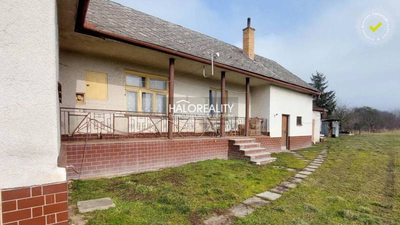 House with a veranda and stairs on residential plots in Ruskovo.
